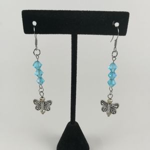 Butterfly earrings light blue faceted glass beads
